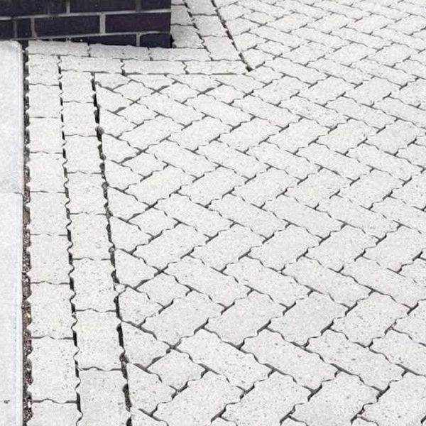 Grey block paving after rotary deep clean - original colour restored