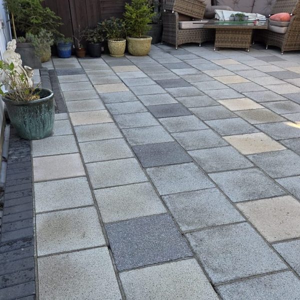 Patio slabs after professional cleaning - original colour restored